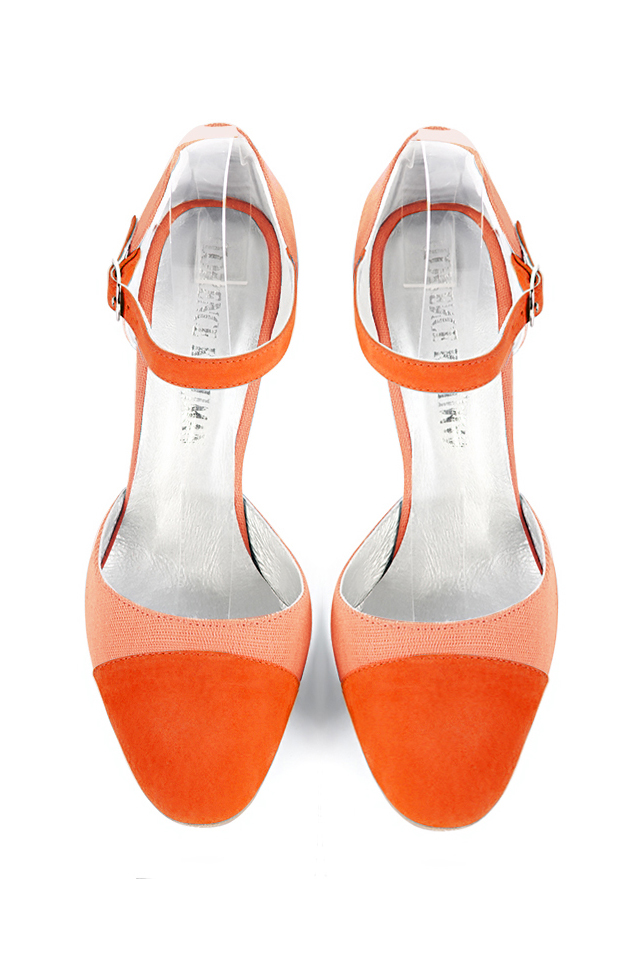 French elegance and refinement for these clementine orange dress open side shoes, with an instep strap, 
                available in many subtle leather and colour combinations. Its high vamp and fitted strap will give you good support.
To personalize or not, according to your inspiration and your needs.  
                Matching clutches for parties, ceremonies and weddings.   
                You can customize these shoes to perfectly match your tastes or needs, and have a unique model.  
                Choice of leathers, colours, knots and heels. 
                Wide range of materials and shades carefully chosen.  
                Rich collection of flat, low, mid and high heels.  
                Small and large shoe sizes - Florence KOOIJMAN